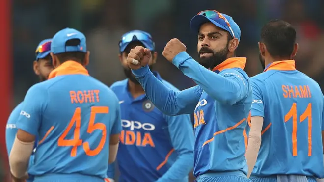 कोहली और टीम