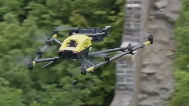 A drone flies over the Great Wall of China