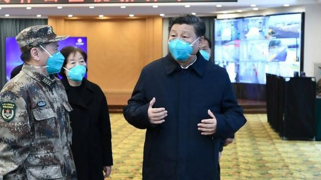 Xi Jinping speaks with workers at the Huoshenshan hospital