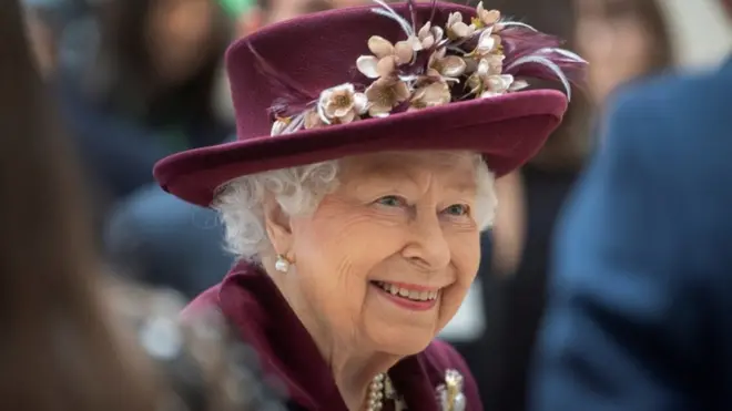 Queen Elizabeth II talks with MI5 officers during a visit to the headquarters of MI5, which is the United Kingdom"s domestic counter-intelligence and security agency, at Thames House in London, Britain February 25, 2020.