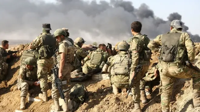 تنفي قوات سوريا الديمقراطية، المشكلة من أغلبية كردية، استيلاء الأتراك على مدينة رأس العين