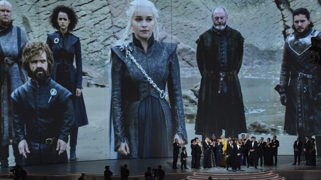 D. B. Weiss, David Benioff (C) and cast and crew accept award for Outstanding Drama Series, 'Game of Thrones' during the 70th Emmy Awards