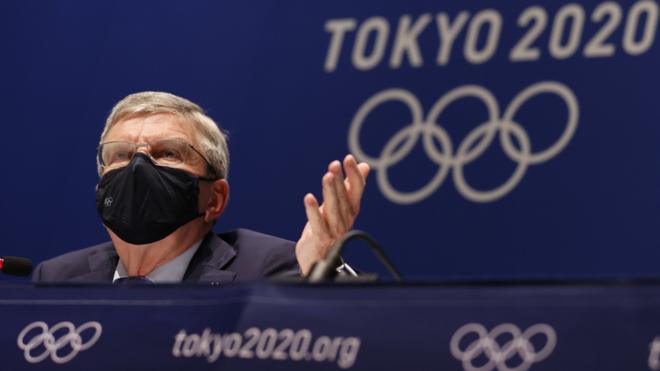 Thomas Bach speaking at a news conference