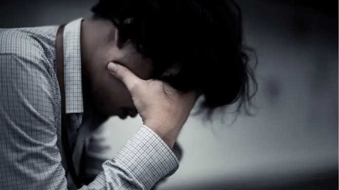 Business man is stressed from his work. depression and anxiety concept.