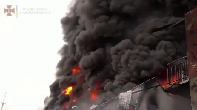 Flames and smoke at a building in Lviv