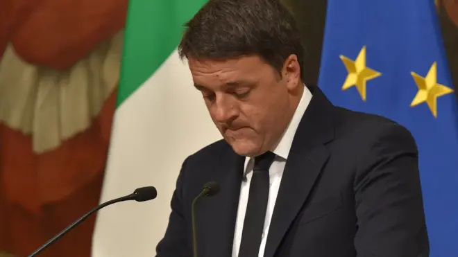 Italy"s Prime Minister Matteo Renzi announces his resignation during a press conference at the Palazzo Chigi after the results of the vote for a referendum on constitutional reforms, on 4 December 2016 in Rome.