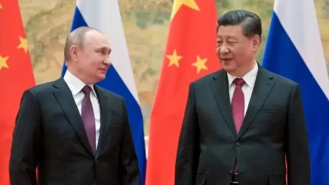 Putin dan Xi Jinping dalam pertemuan di Beijing.