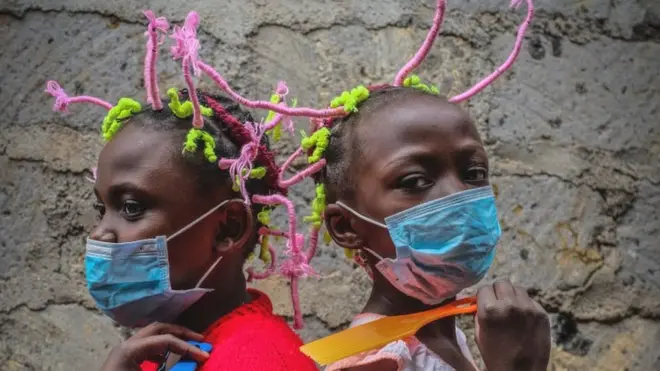 Girls in Kenya wearing masks