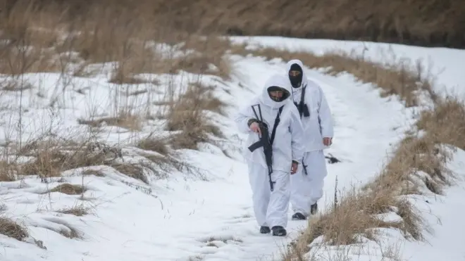 Ukrainian border guards patrol in Chernihiv region near the Russian border