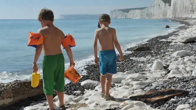 Two young boys on a beach