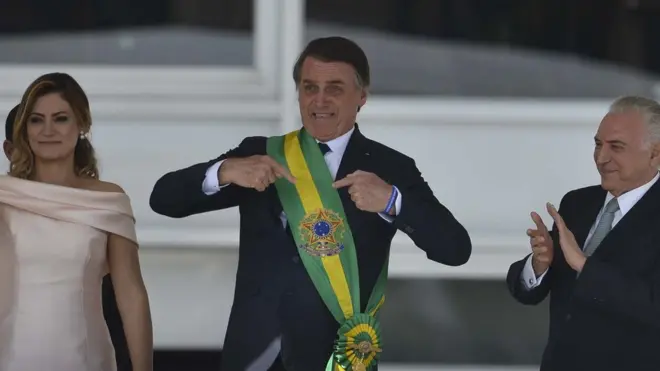 Bolsonaro emsportsbet io tem bonusposse,sportsbet io tem bonus1°sportsbet io tem bonusjaneirosportsbet io tem bonus2019, ao lado da mulher Michelle e do antecessor, Michel Temer