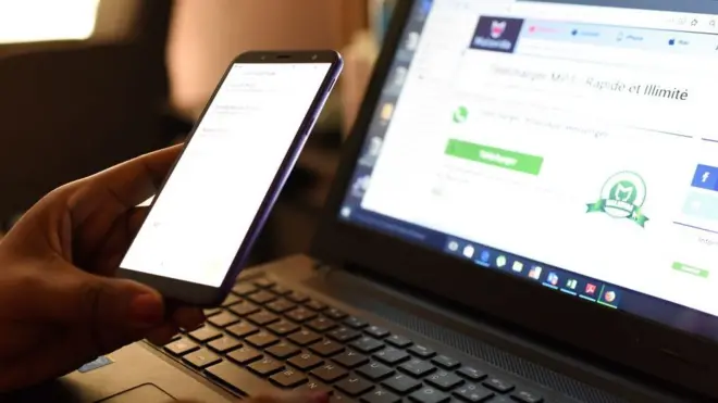 Pesin dey look computer laptop and phone