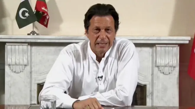 Imran Khan giving his televised speech from his home on the outskirts of Islamabad