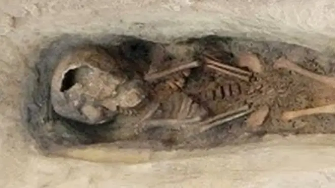 The remains of a small child were found along with linen used to mummify the corpse