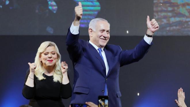 Israel's Prime Minister Benjamin Netanyahu and his wife Sarah celebrate following the election in Tel Aviv, Israel, early 10 April 2019