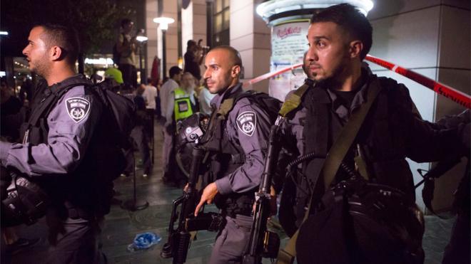 Israeli security personnel at the scene of a shooting in Tel Aviv on 8 June 2016
