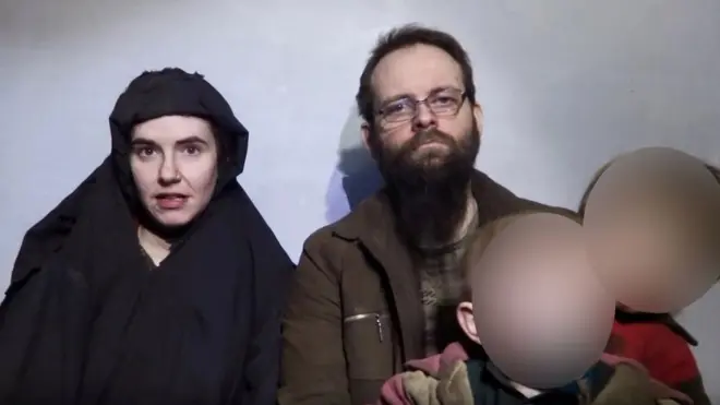 A still image from a video posted by Afghan insurgents on social media showing Caitlan Coleman, her Canadian husband Joshua Boyle and two boys