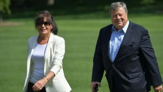 Viktor Knavs na car salesman for Slovenian town of Sevnica, while im wife Amalija dey work for one textile factory. Both of dem dey dia 70s.