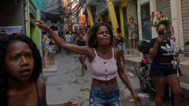 Residents protest after a police operation against alleged drug traffickers at the Jacarezinho favela in Rio de Janeiro