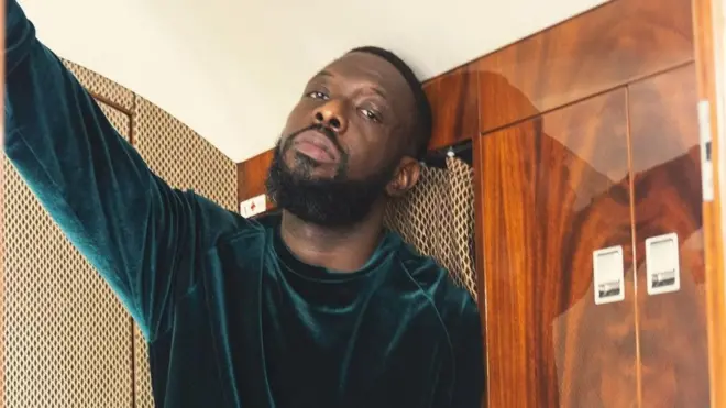 Timaya pose inside private jet