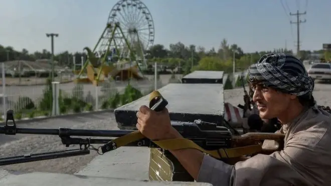 Afghan security personnel fighting against the Taliban in Herat