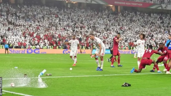Qatar midfielder Salem Al-Hajri was hit on the head after his side's third goal