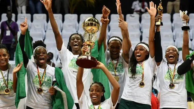 Nigeria D'Tigress team players celebrate as dem win Women Afrobasket Cup 2019