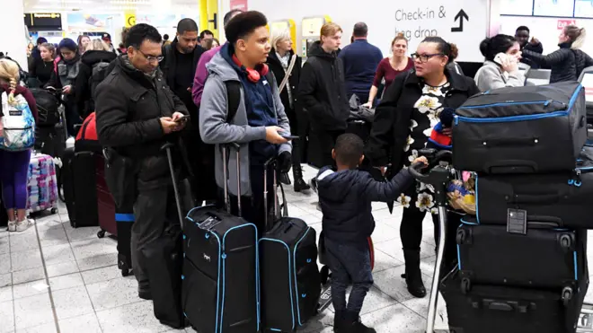 Queues inside Gatwick Airport