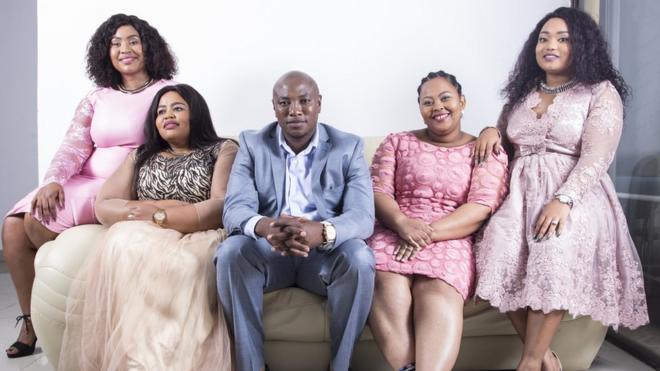 Musa Mseleku and his four wives on a South African reality TV show