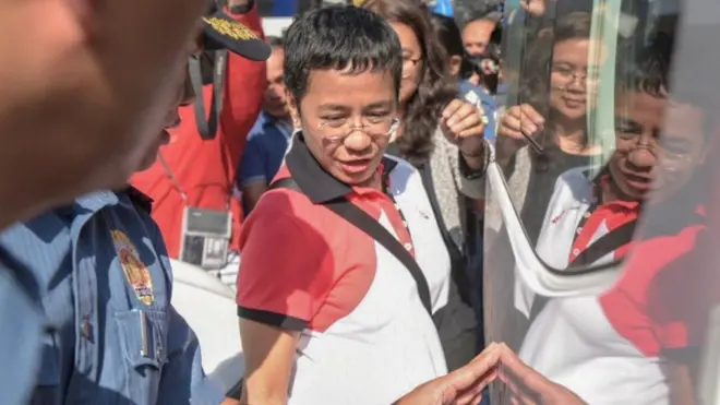 An arrest warrant was issued for the award winning journalist on her arrival at Manila airport