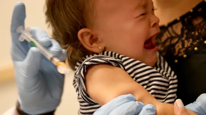 A baby is vaccinated