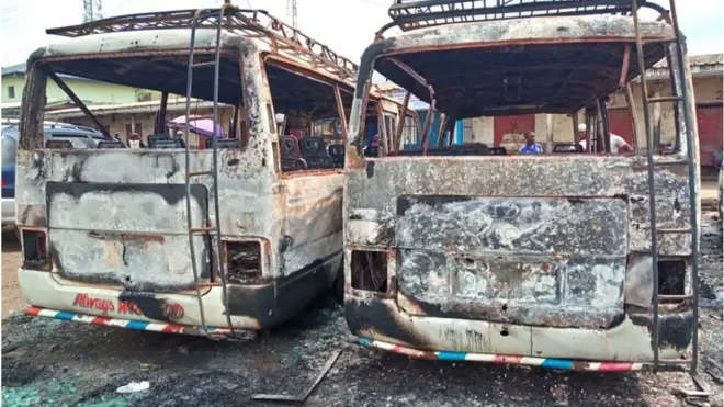 A picture taken on July 10, 2018 shows burned busses at the bus terminal in Buea. - Gunfire broke out on July 9 in Buea, the capital of a western region of Cameroon gripped by violence between anglophone separatists and security forces