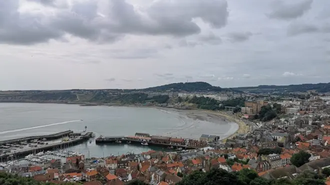 The boy was swept across Scarborough's South Bay by the wind and tide