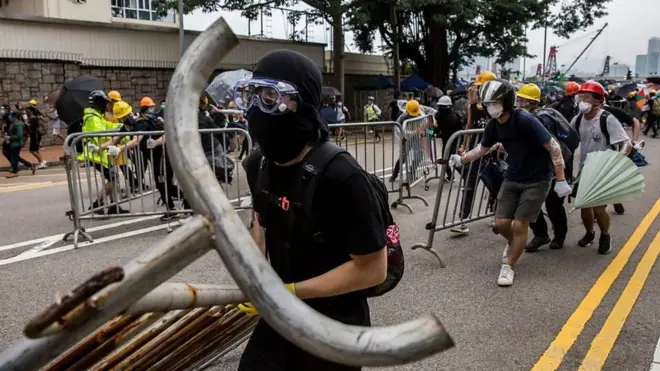 A protestor wearing mask