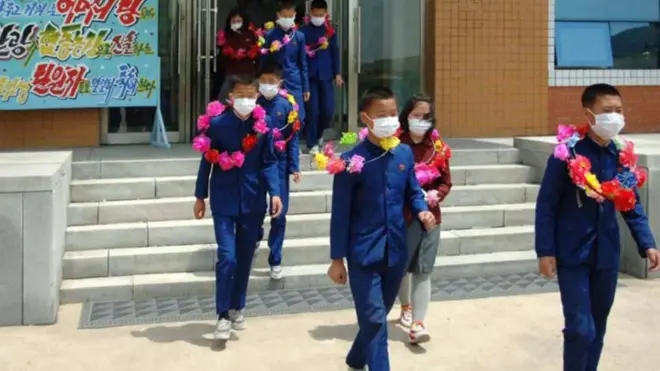 State media broadcast photos of a ceremony for the children who allegedly volunteered