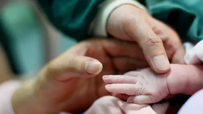 A newborn baby's hand