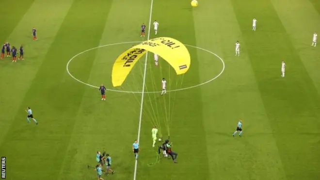 The protestor was given medical attention before being escorted away