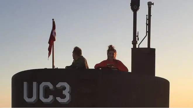 Peter Madsen next to Kim Wall on submarine
