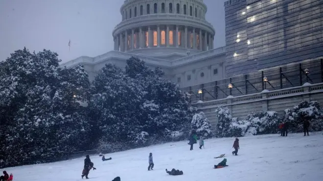 People took to Capitol Hill to sled down the slope.