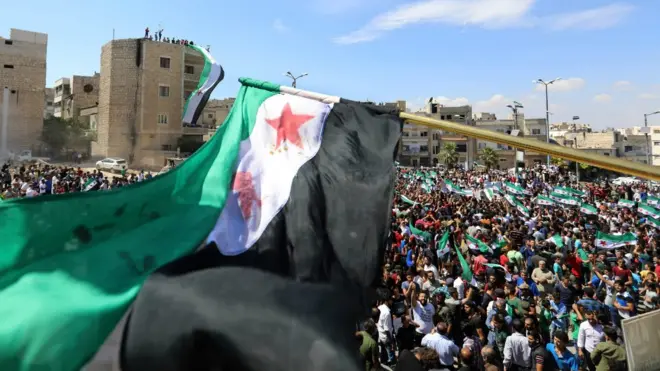 Protesters in the city of Idlib called for international help to stop the expected offensive