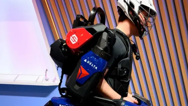 A man wearing a Sarcos Robotics exoskeleton