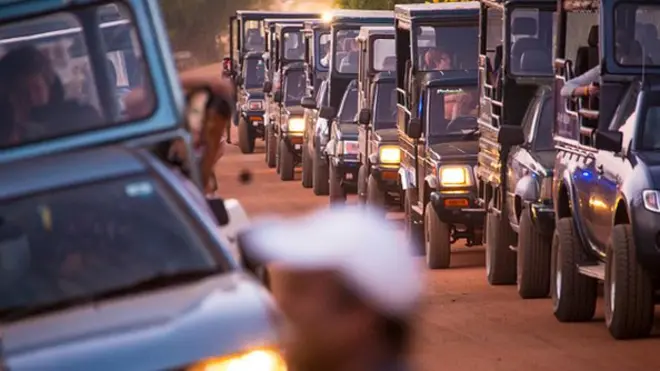 YALA, SRI LANKA - FEBRUARY 28: Tourists and local people on a guided Safari tour at Yala West (Ruhuna) National Park for watching leopards, buffalos and other wildlife animals on February 28, 2014 in Yala, Sri Lanka