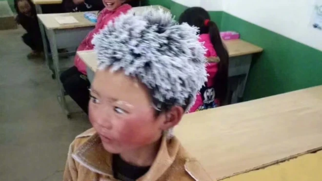 Pictures of eight-year-old Little Wang were shared tens of thousands of times