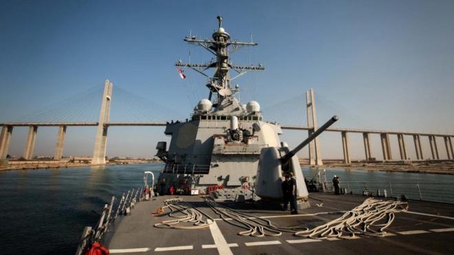 The USS Carney destroyer transits the Suez Canal in Egypt