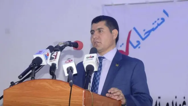 معاذالله دولتی، معاون مالی و اداری کمیسیون مستقل انتخابات افغانستان می‌گوید رئیس جمهوری اشرف غنی از او خواست کناره‌گیری کند