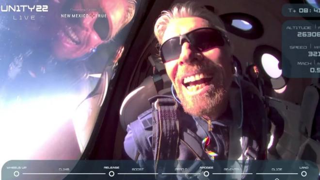 Billionaire Richard Branson reacts on board Virgin Galactic"s passenger rocket plane VSS Unity after reaching the edge of space above Spaceport America near Truth or Consequences, New Mexico, U.S. July 11, 2021