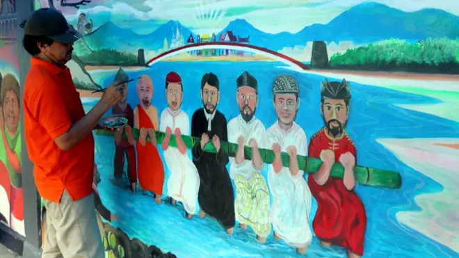 Seorang peserta mengerjakan pembuatan mural saat Festival Mural Maluku di Ambon, Maluku, beberapa waktu lalu. Komisioner Badan Pengawas Pemilu Maluku menilai potensi konflik terkait Pilkada 2018 sama sekali tidak tampak.