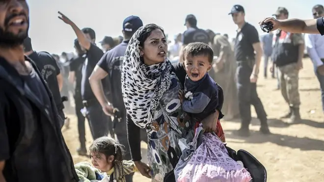 Familia de refugiados kurdos.