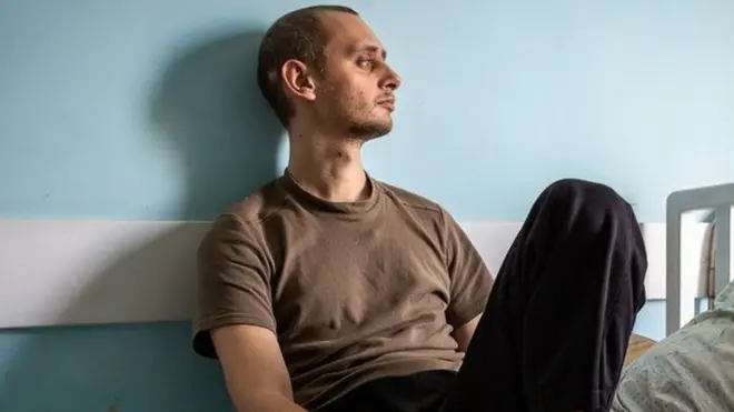 Nikita Horban sits in a medical facility in Zaporizhzhya, Ukraine. "It still hurts," he said. "The wounds are still fresh."