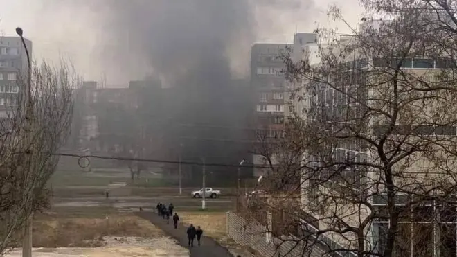 Smoke rising in a residential district of Mariupol